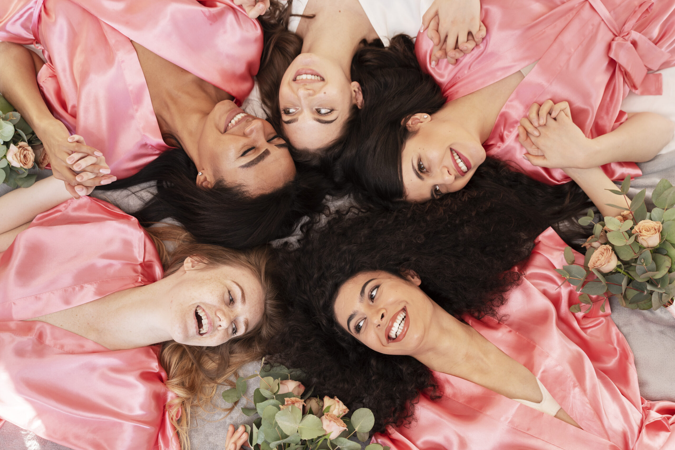 team bride celebrating before wedding scaled